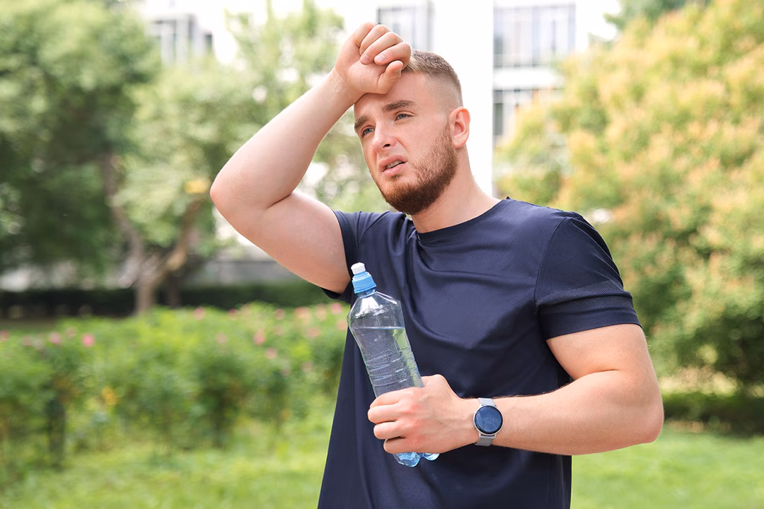 A young man suffering from heatstroke