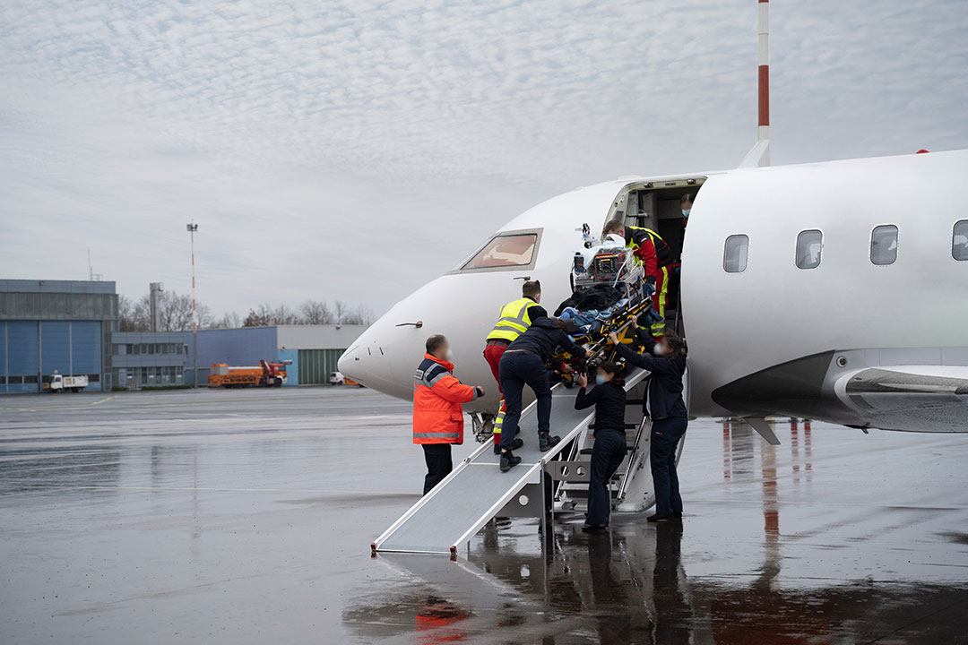 A patient being placed on an air ambulance