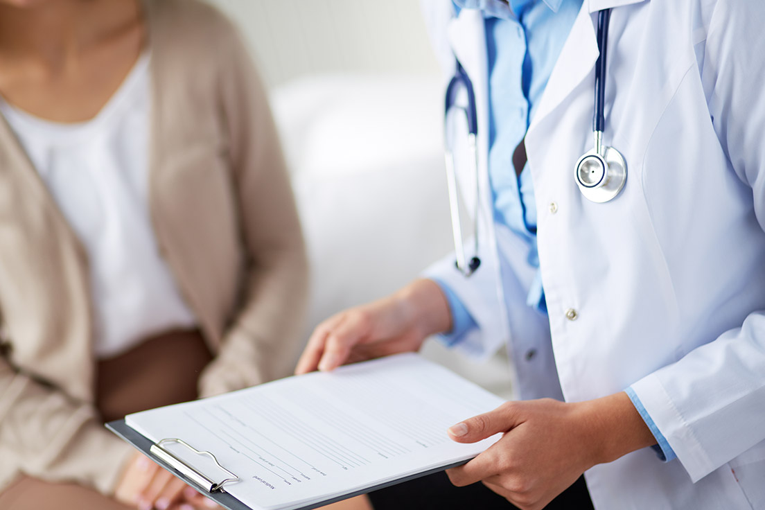 A doctor sharing a report A doctor sharing a report