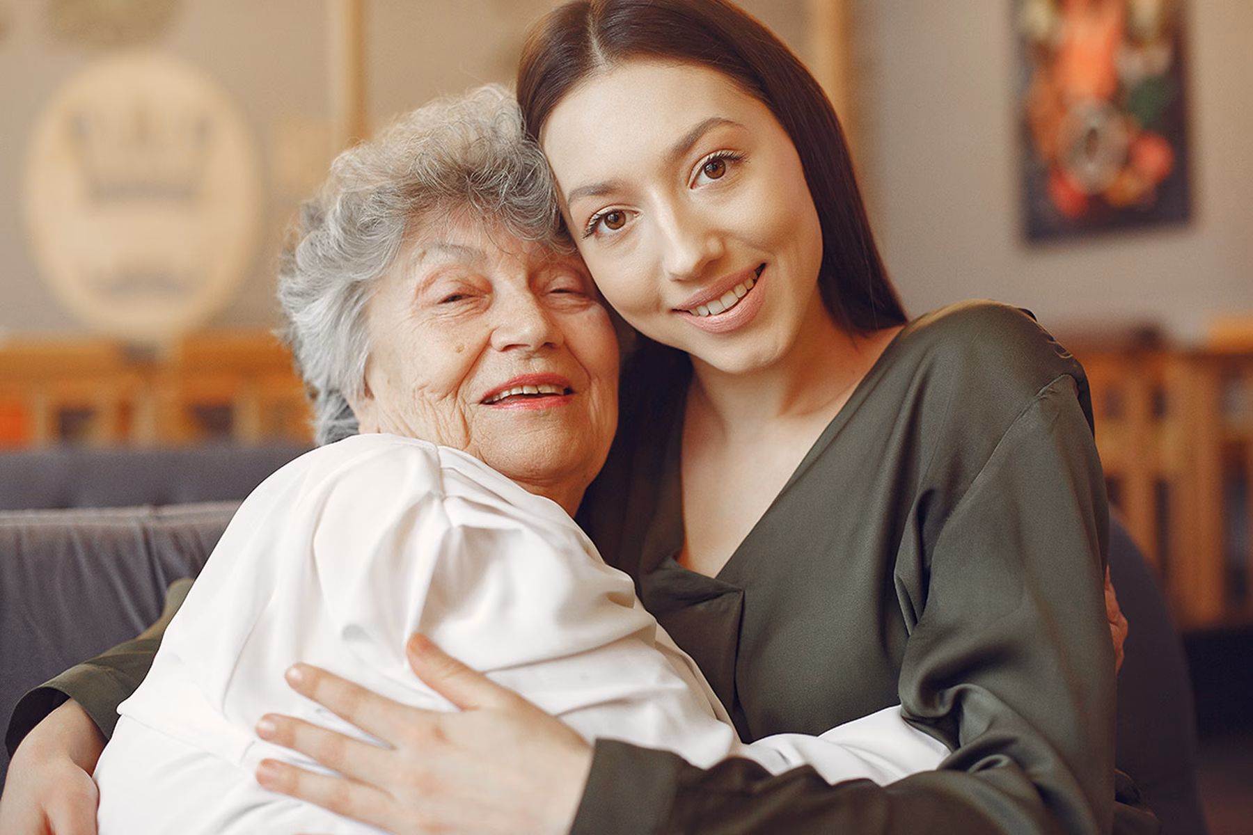 old-lady-hugging-granddaughter