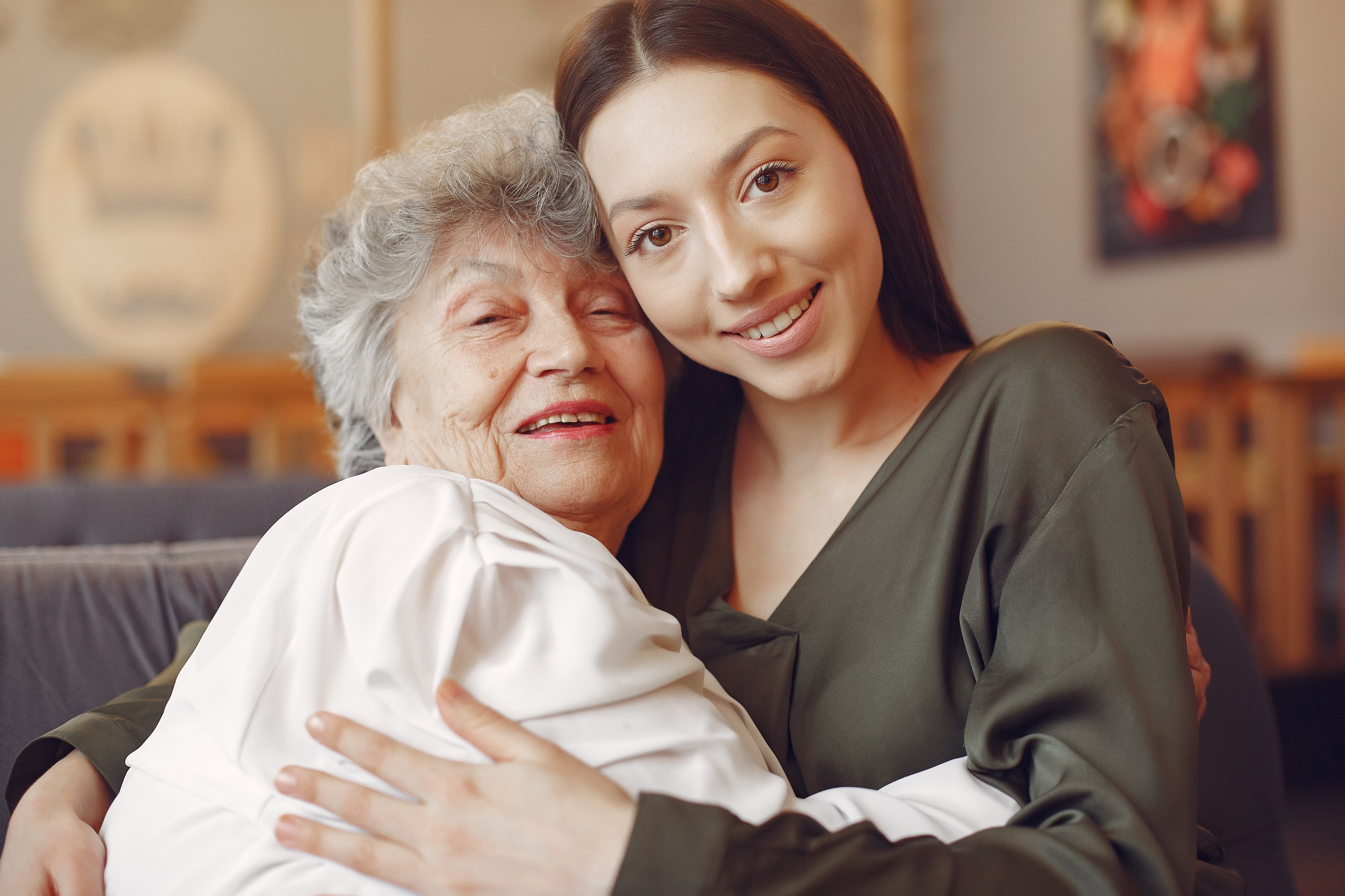 old-lady-hugging-granddaughter