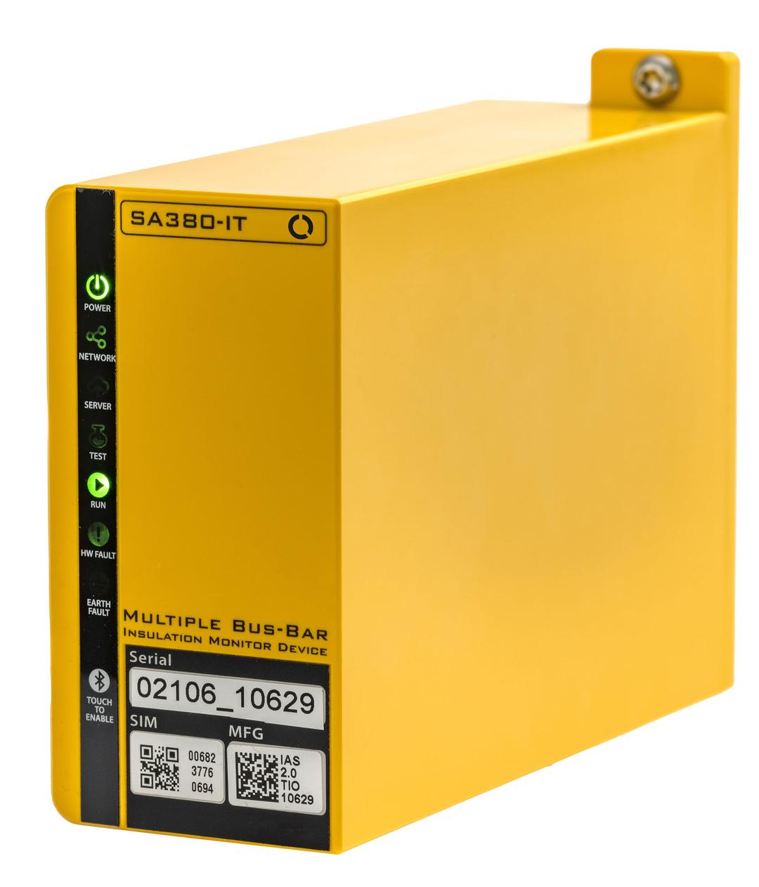 Yellow SA380-IT insulation monitor device with multiple indicator lights and a visible serial number label on the front.