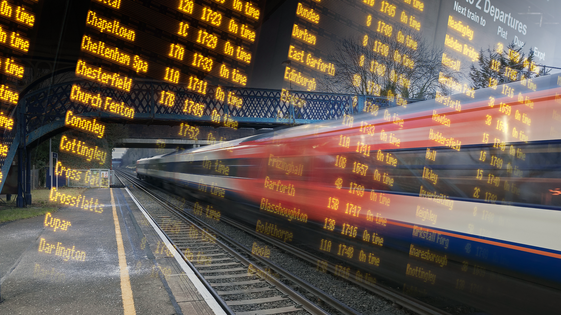 A blurred high-speed train passes through a station, overlaid with transparent digital departure boards displaying various destinations.
