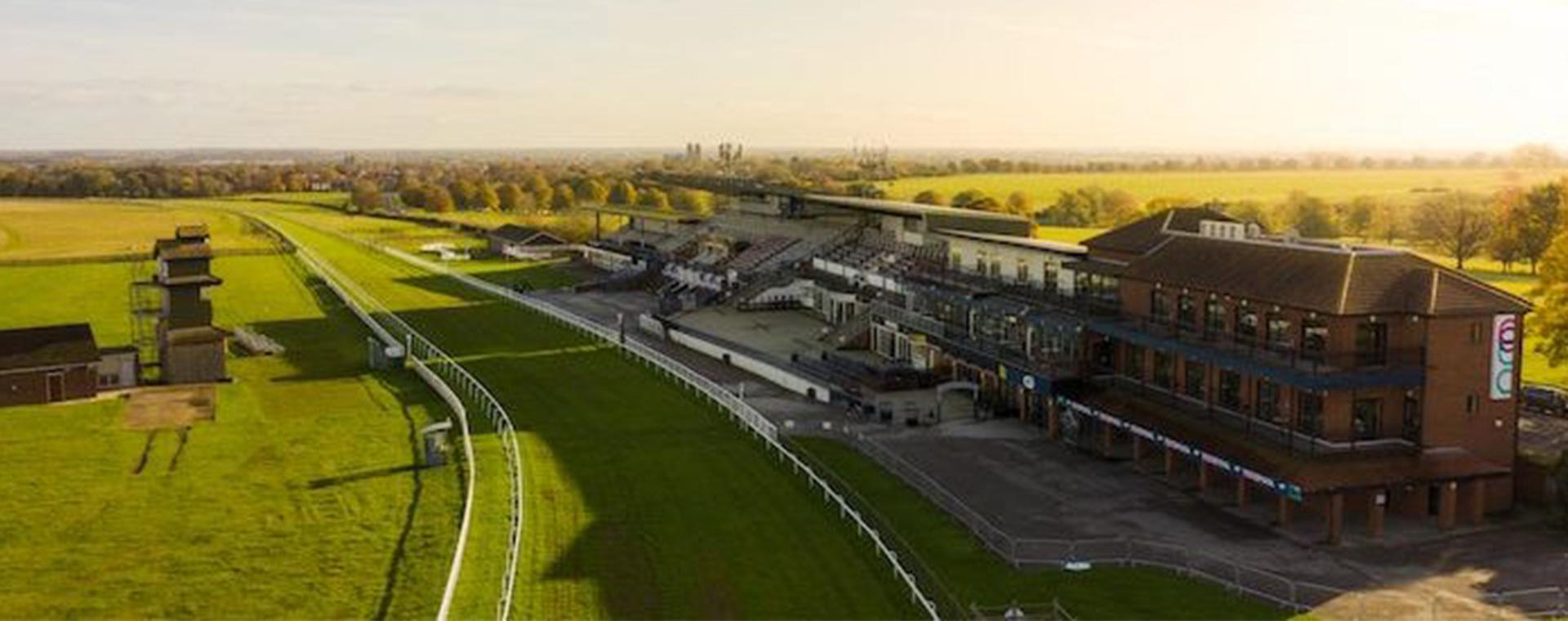 An aerial view of a horse race track.