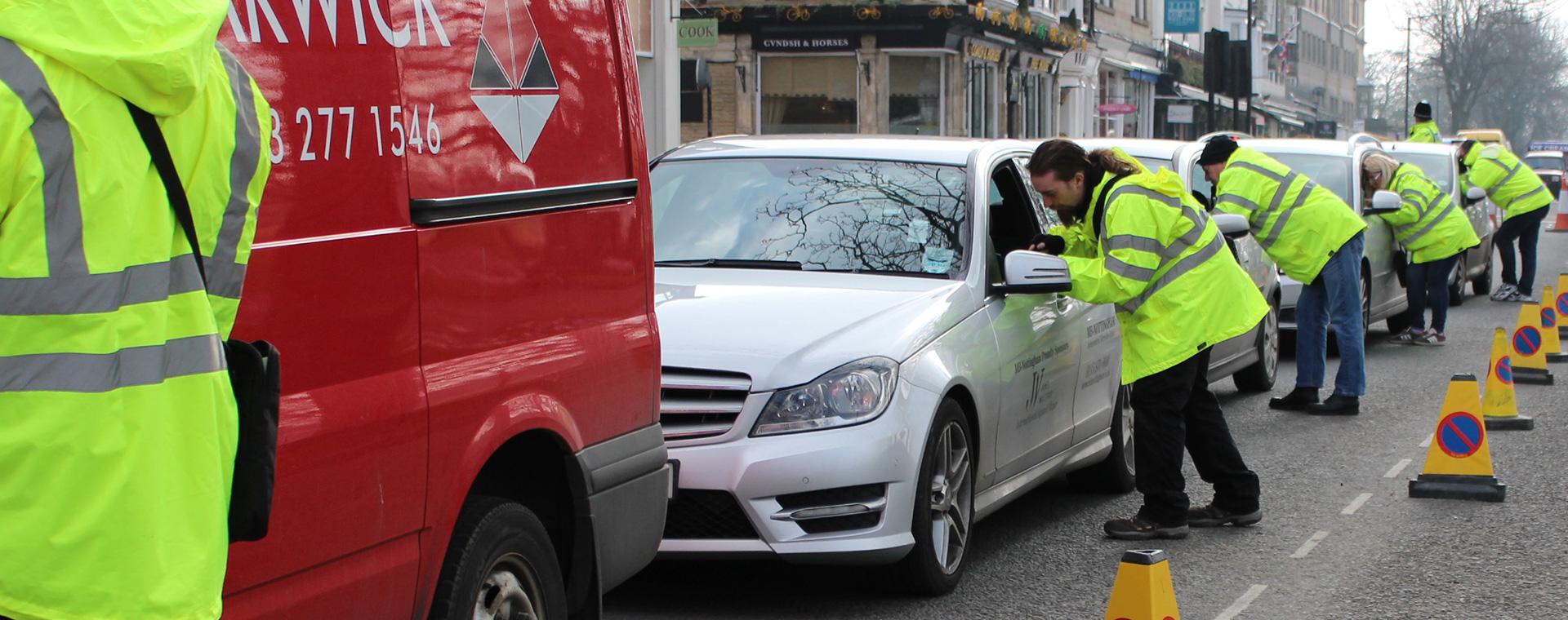 Motorists queueing at a survey