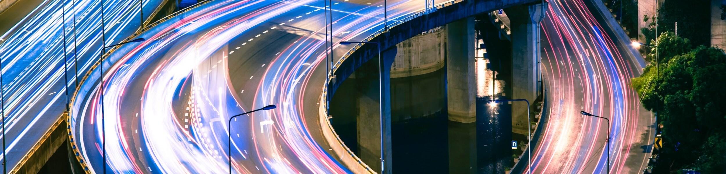 Cars on a bridge with a blurred effect.