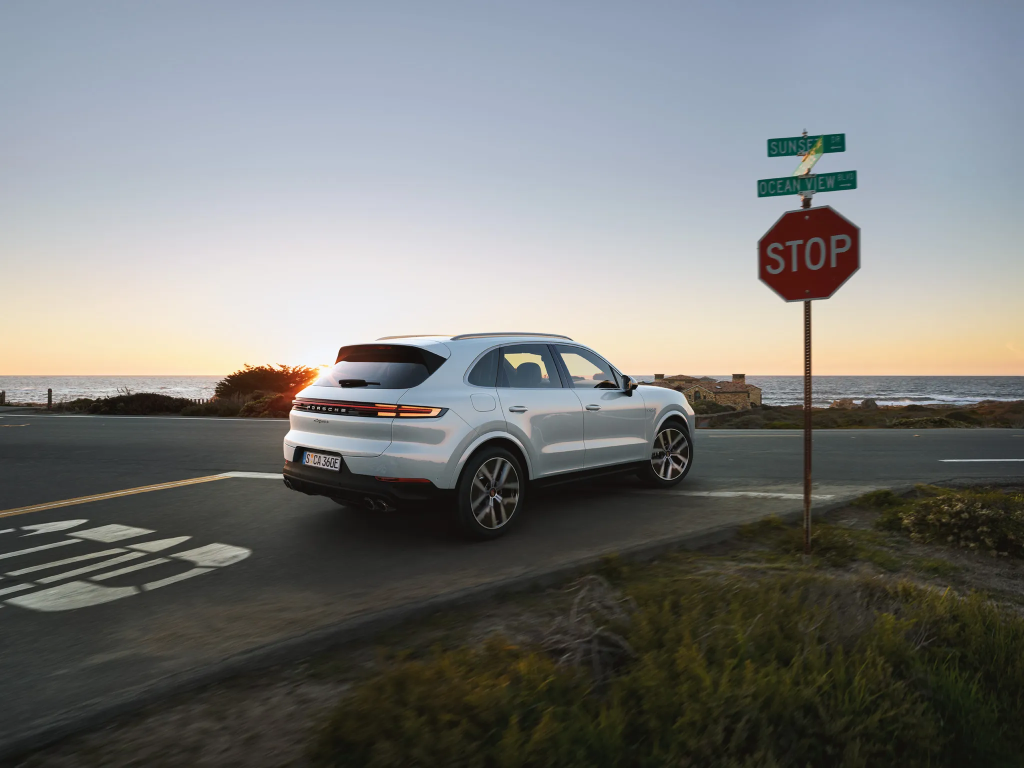 A Porsche Cayenne on the road. 