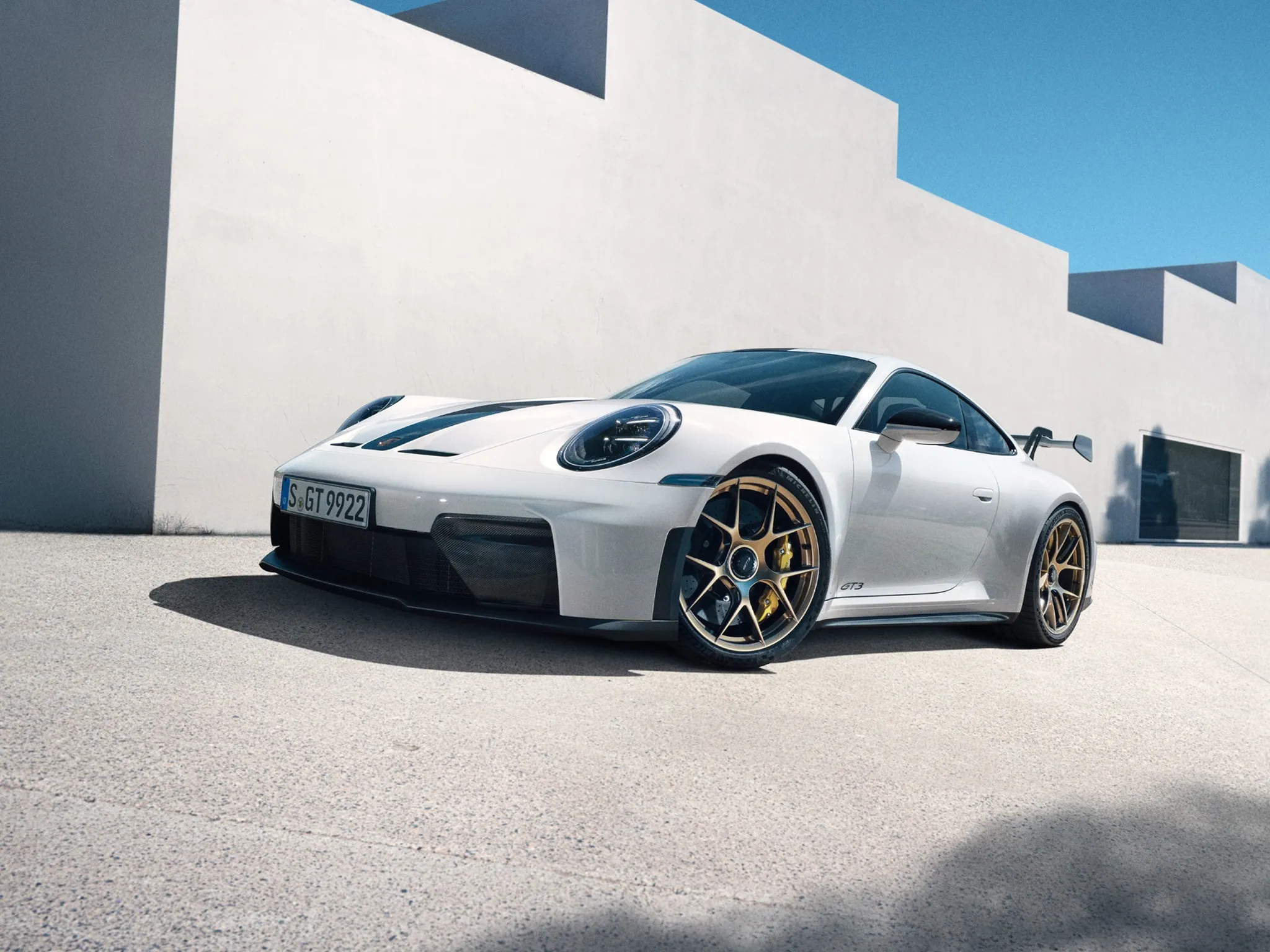 Side view of a Porsche 911 GT3 in White.