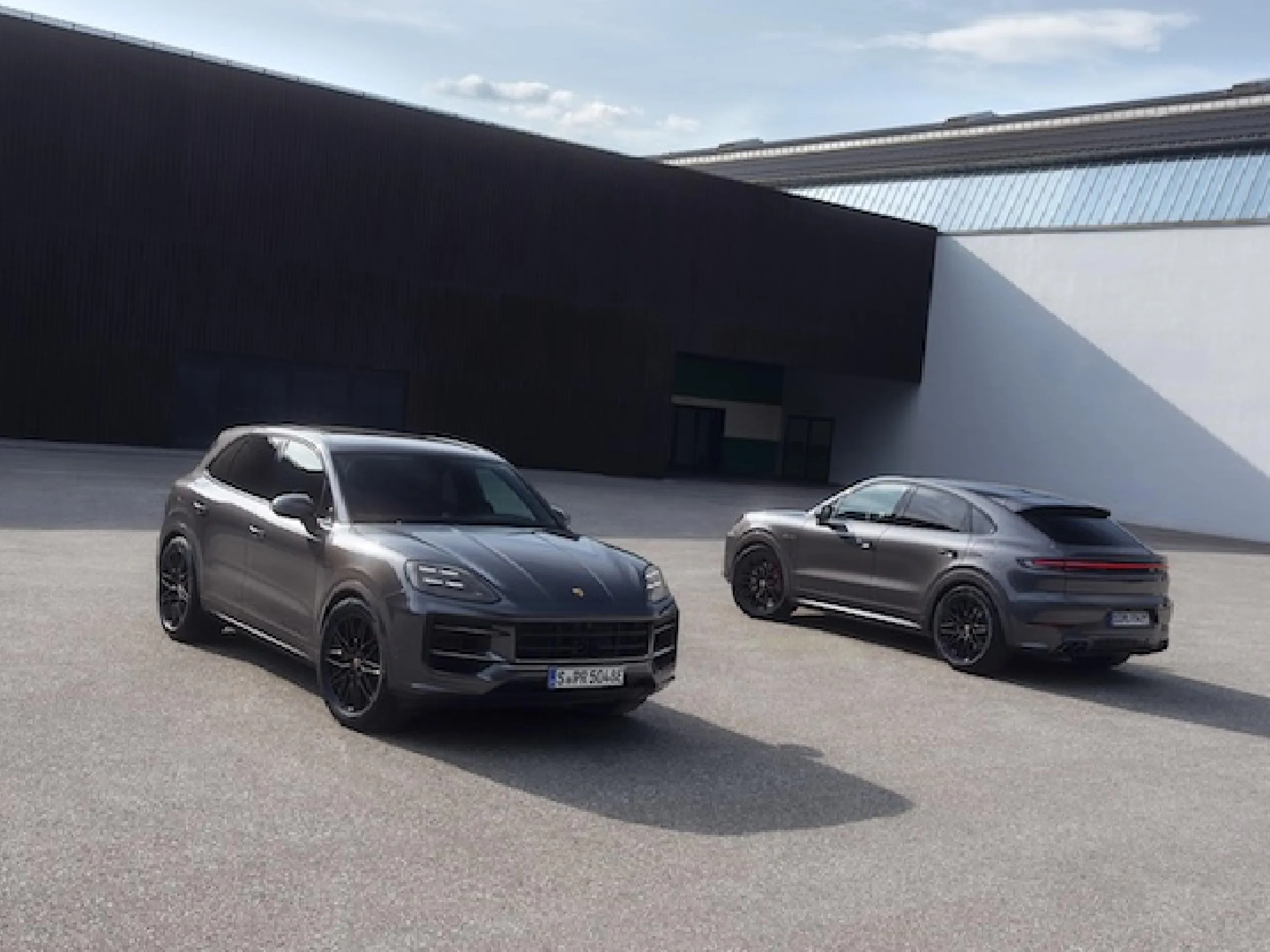 Static black Cayenne SUV and Coupé