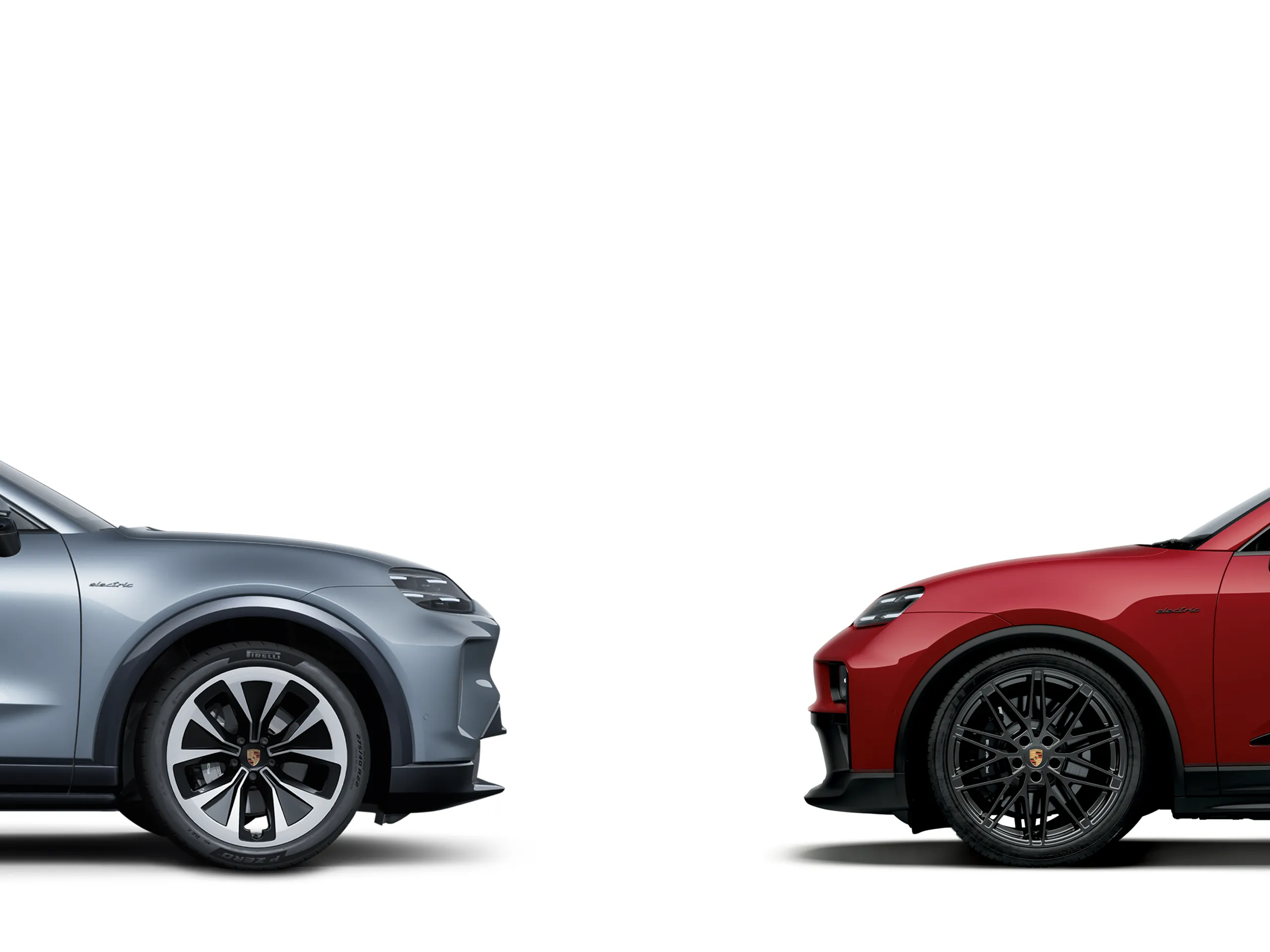 Two Porsche cars facing each other.