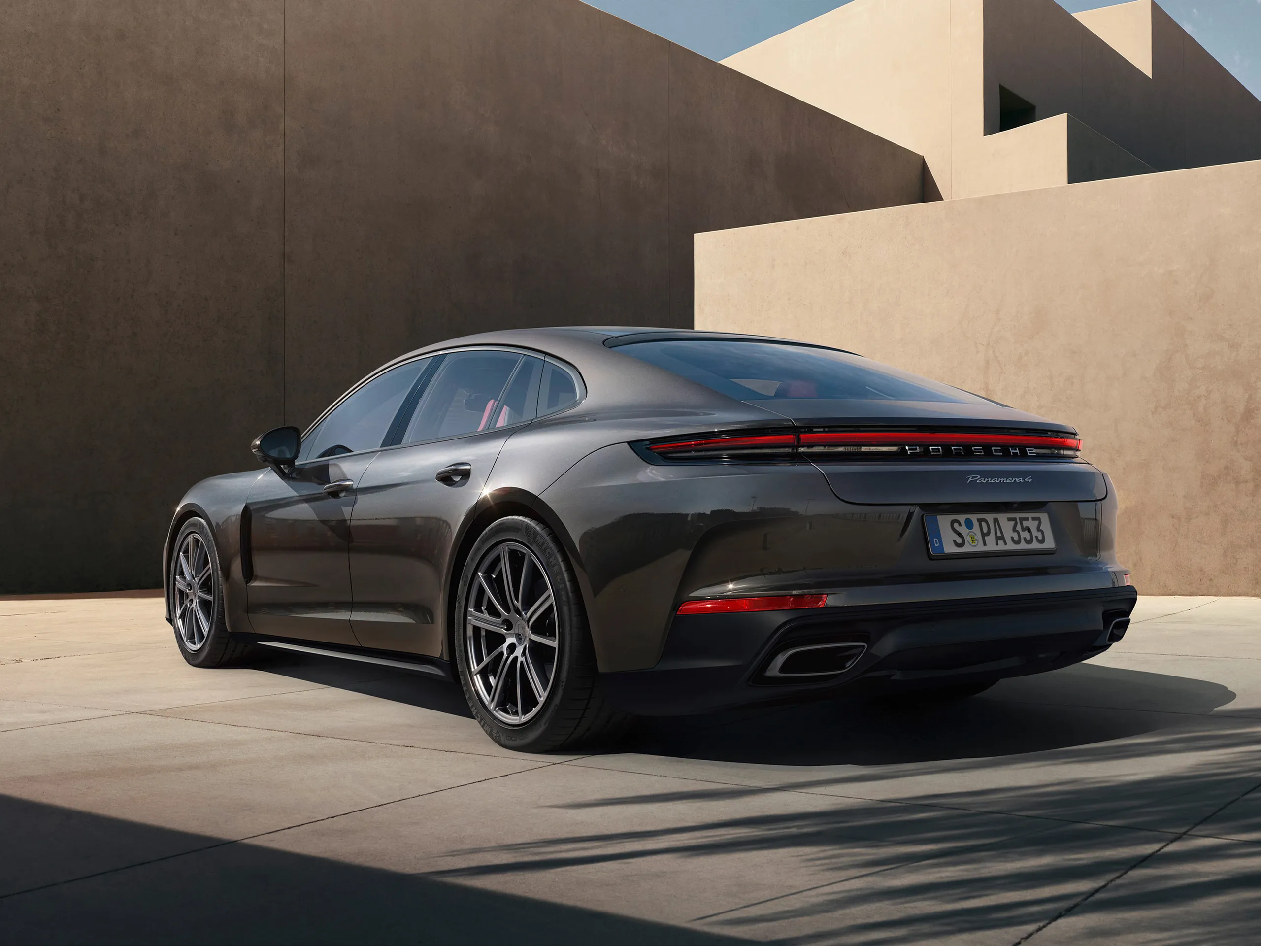 A rear shot of a Panamera 4 parked.