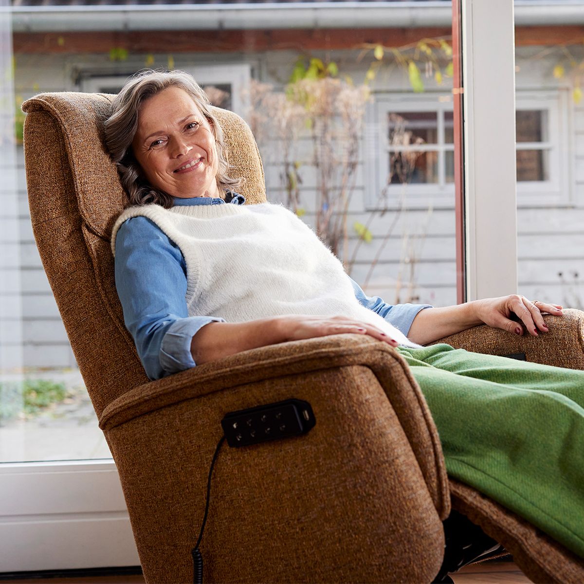 Vrouw in relaxstoel