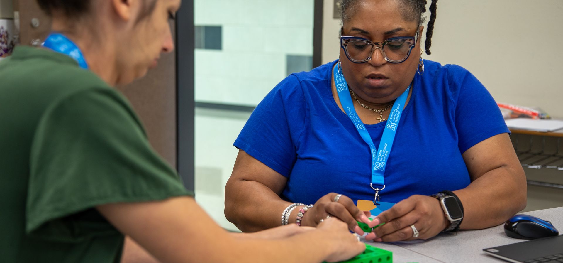 Teachers Working on a Project Together