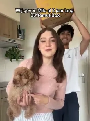 A UGC video of a customer and their dog