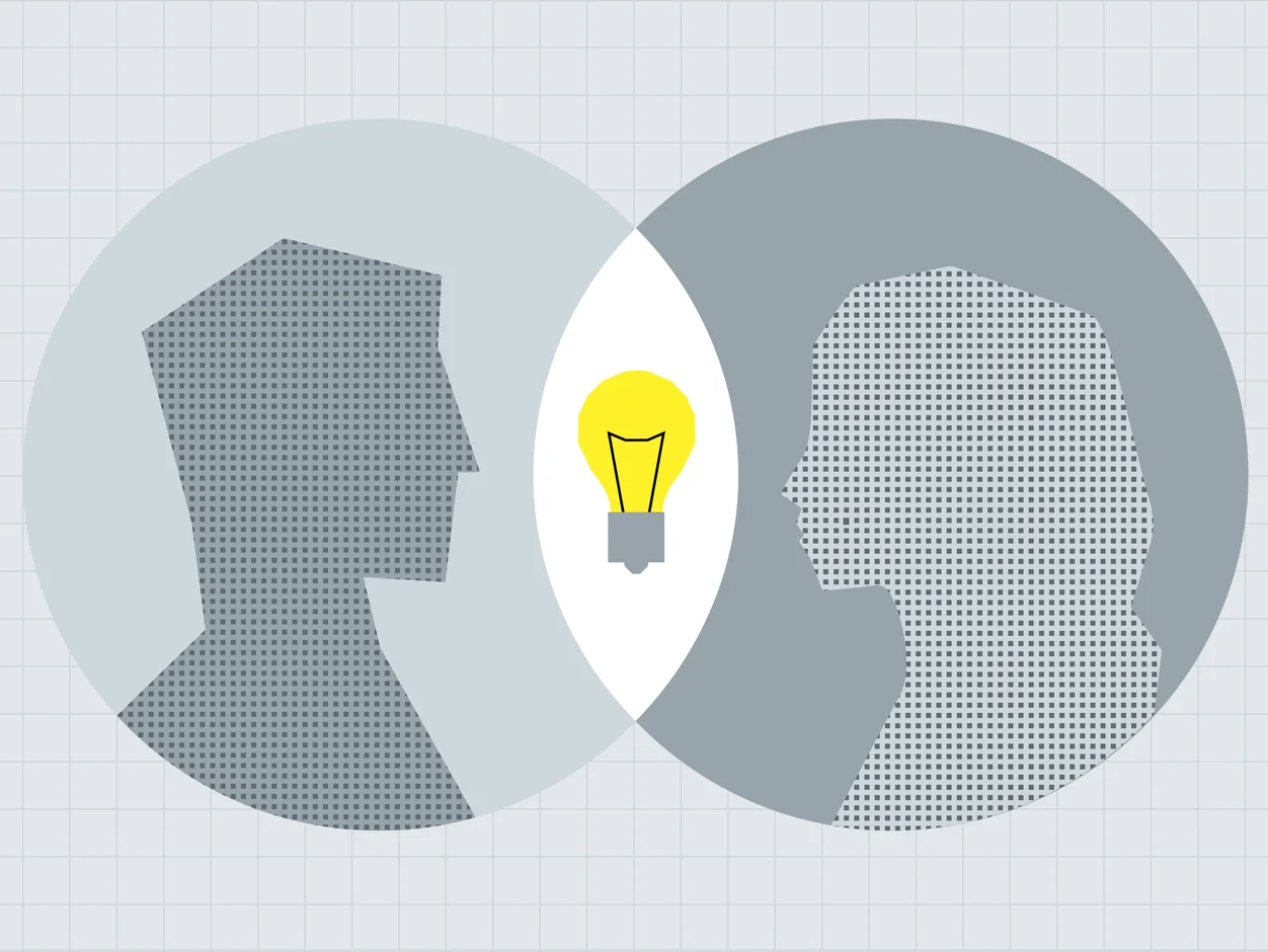 Two profiles in overlapping circles with a shared lightbulb, illustrating partnership