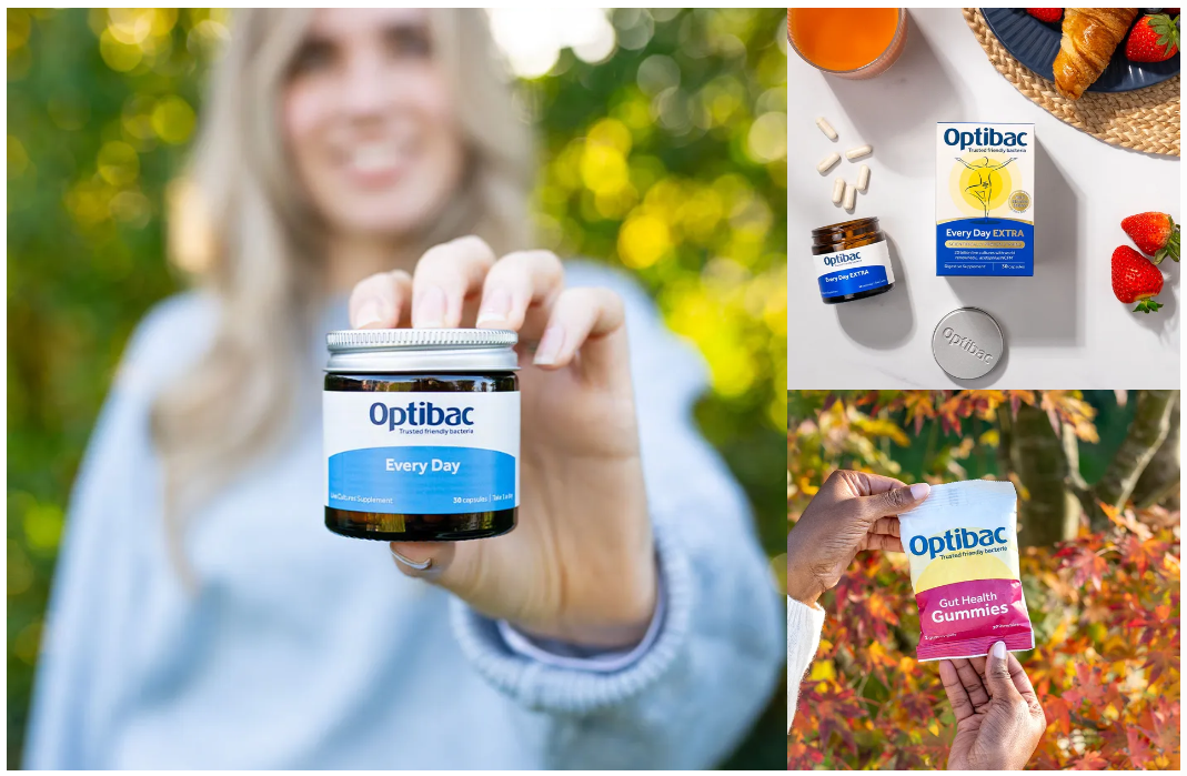 A person holds up a jar of Optibac Every Day supplements. Nearby, Optibac products and fresh berries are displayed outdoors.