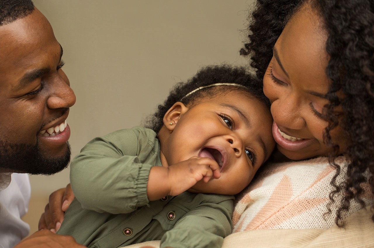Mother & father with child