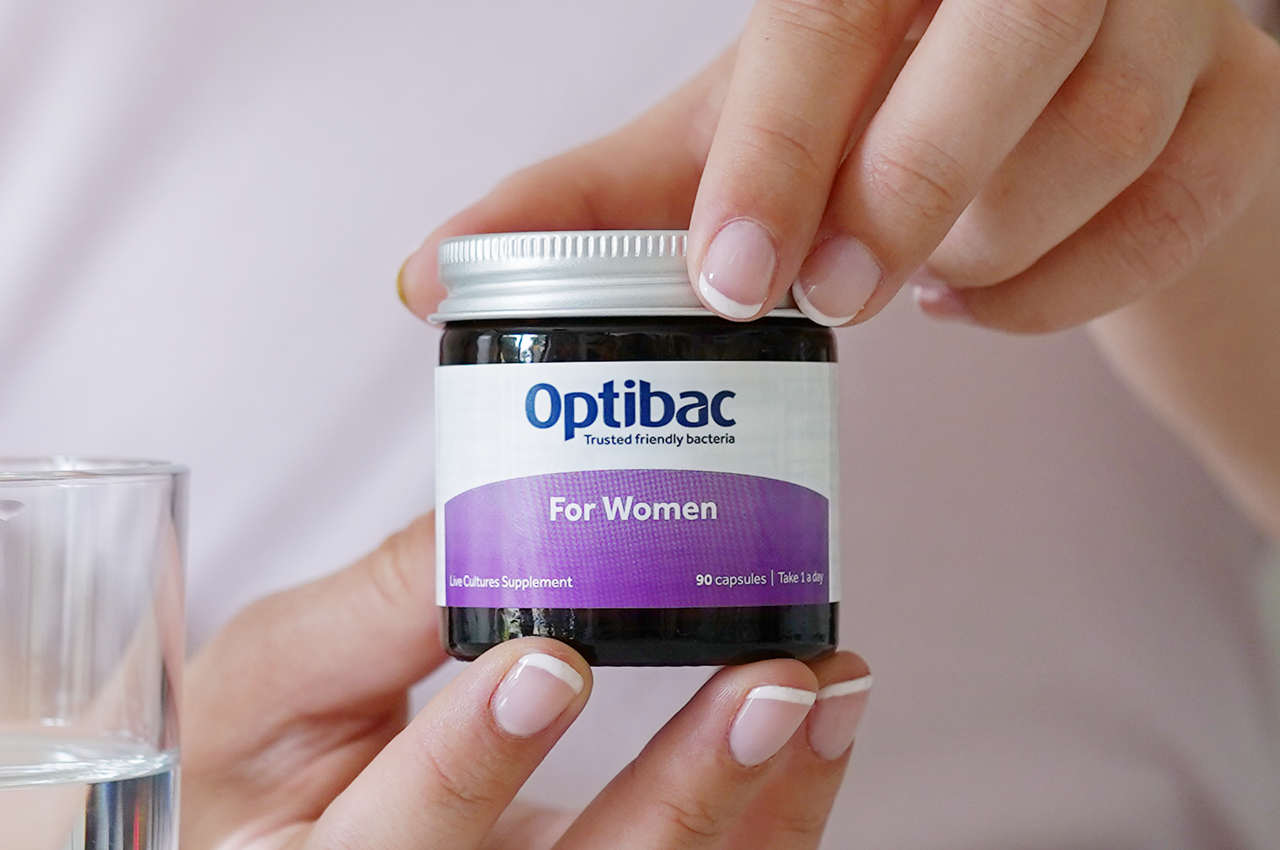 Person holding for women jar