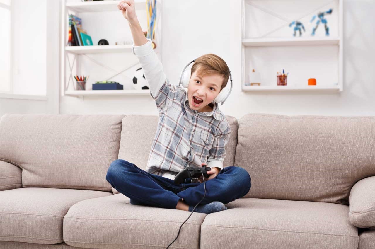 boy playing video games