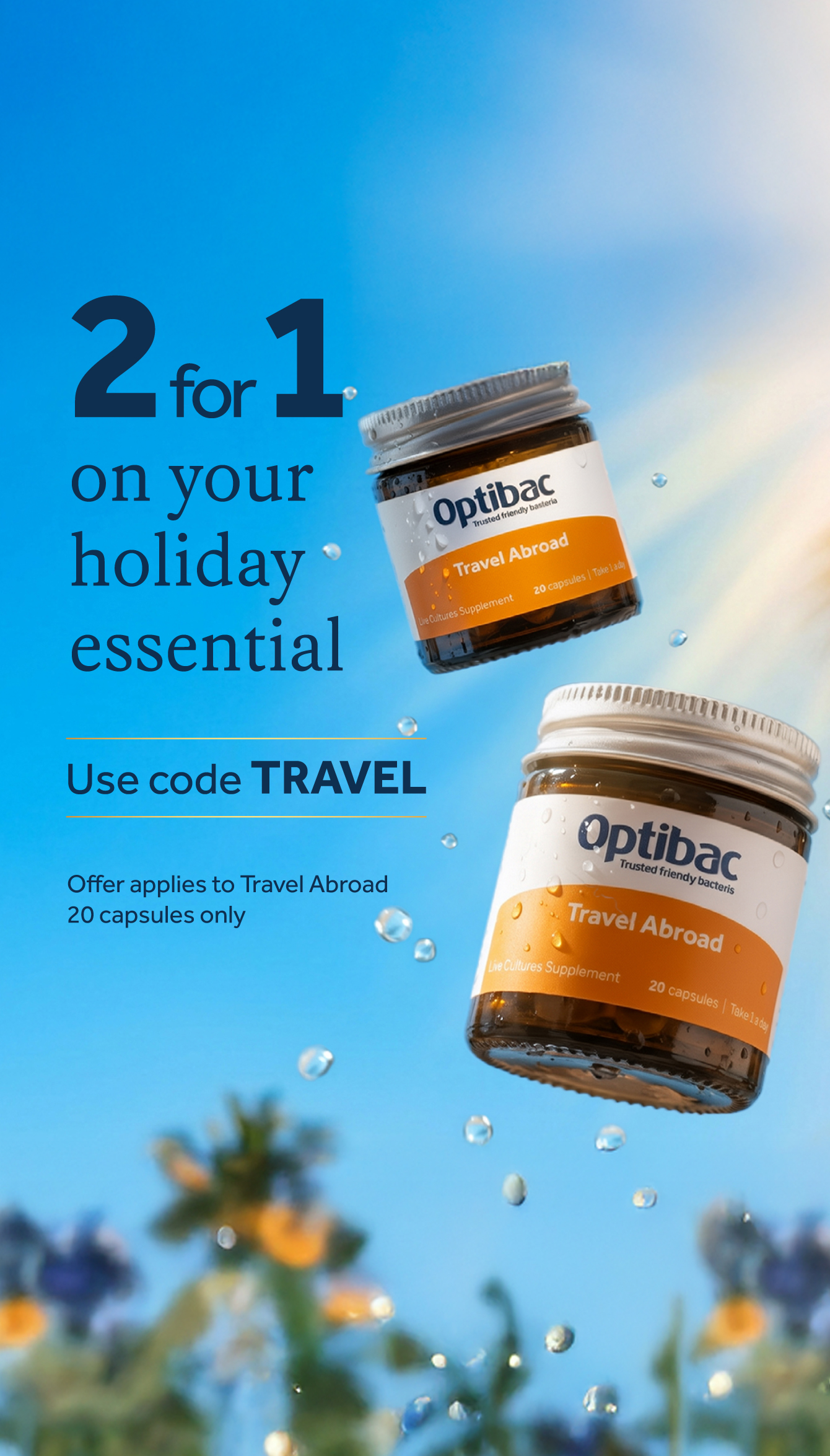 Two jars of Optibac Travel Abroad supplements under blue sky. Text: "2 for 1 on holiday essential, use code TRAVEL." Offer for 20 capsules only.