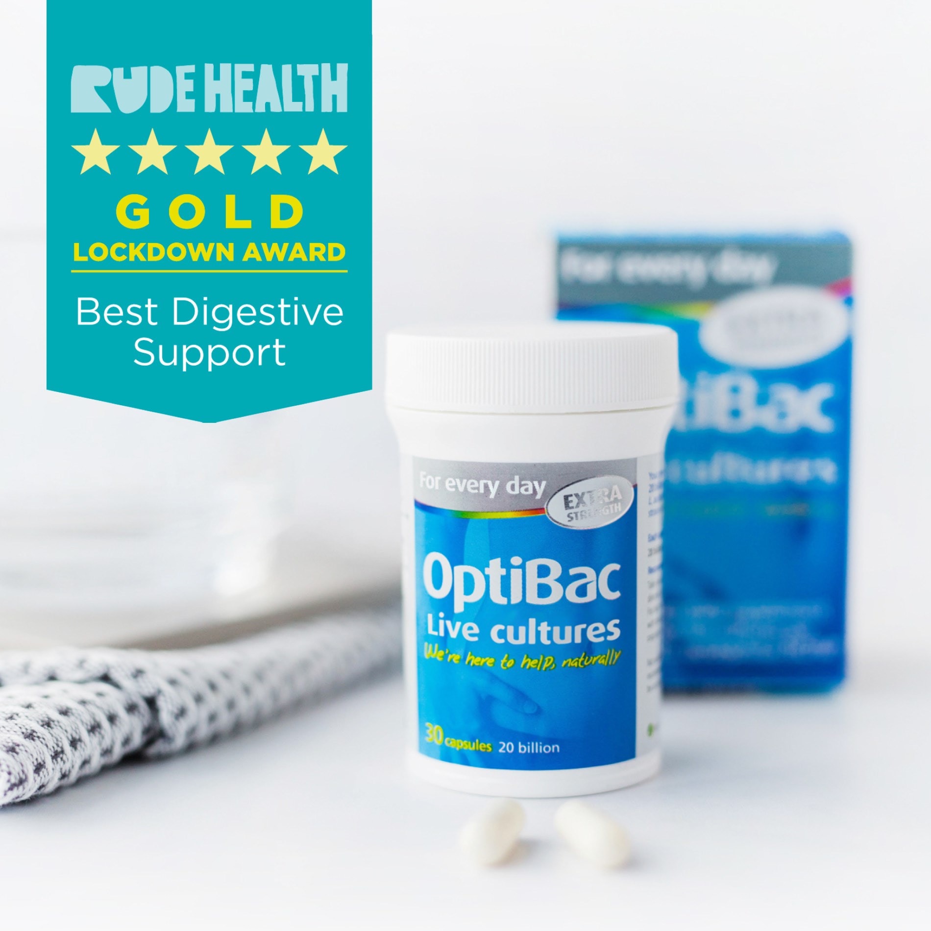 OptiBac Live Cultures supplement bottle with capsules, awarded "Best Digestive Support" by Rude Health.
