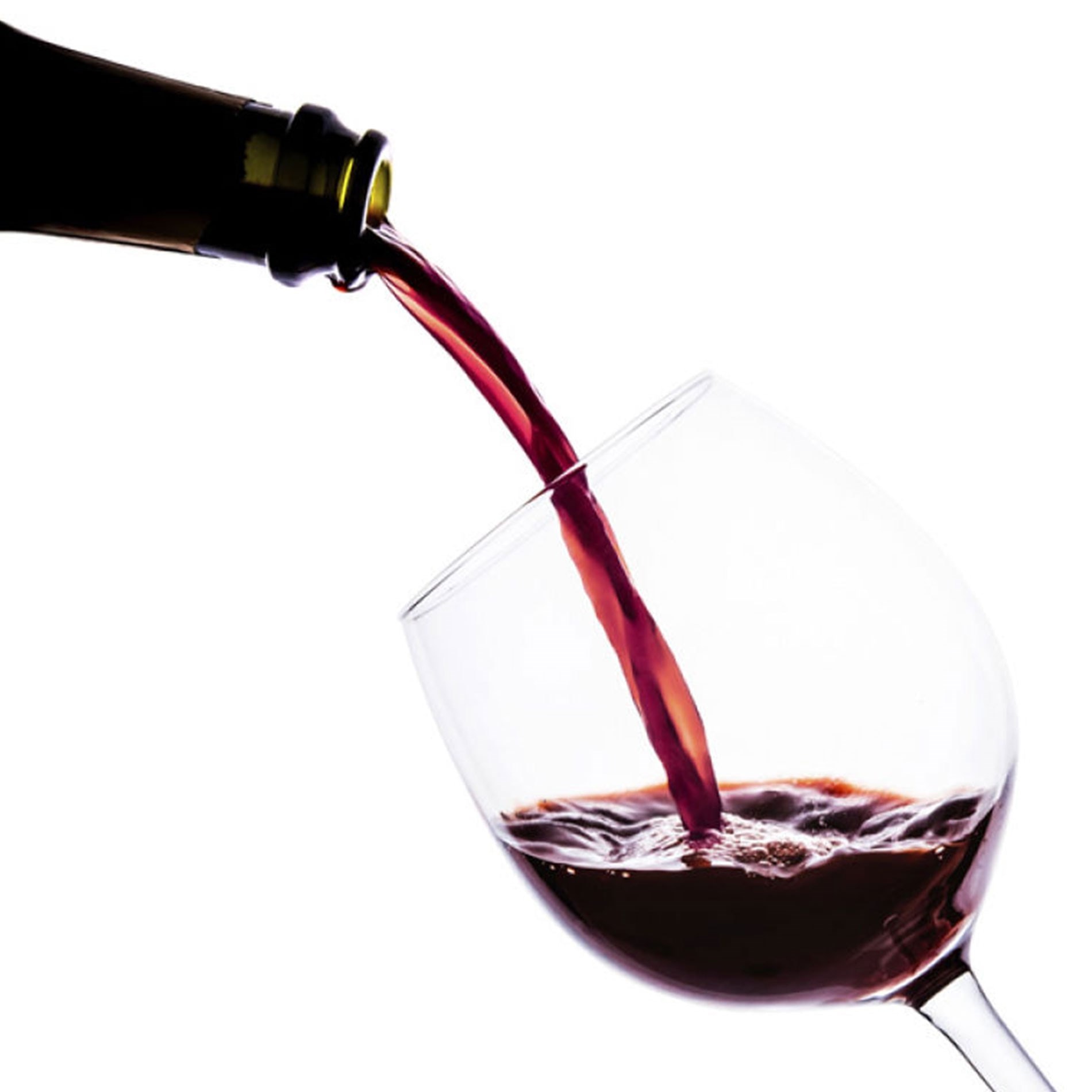 Red wine being poured from a bottle into a tilted glass against a white background.
