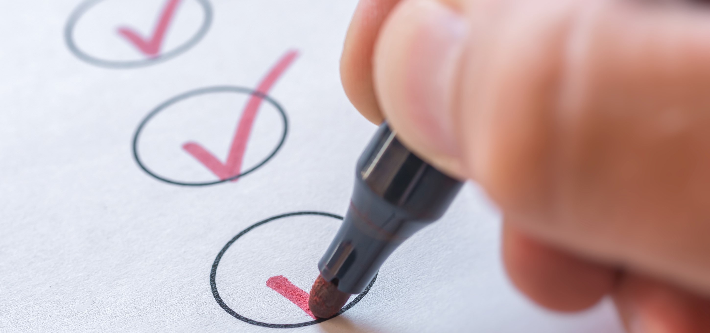 ticking a checklist.