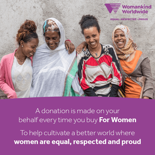 Four women standing together, smiling and laughing, with text promoting Womankind Worldwide and gender equality.
