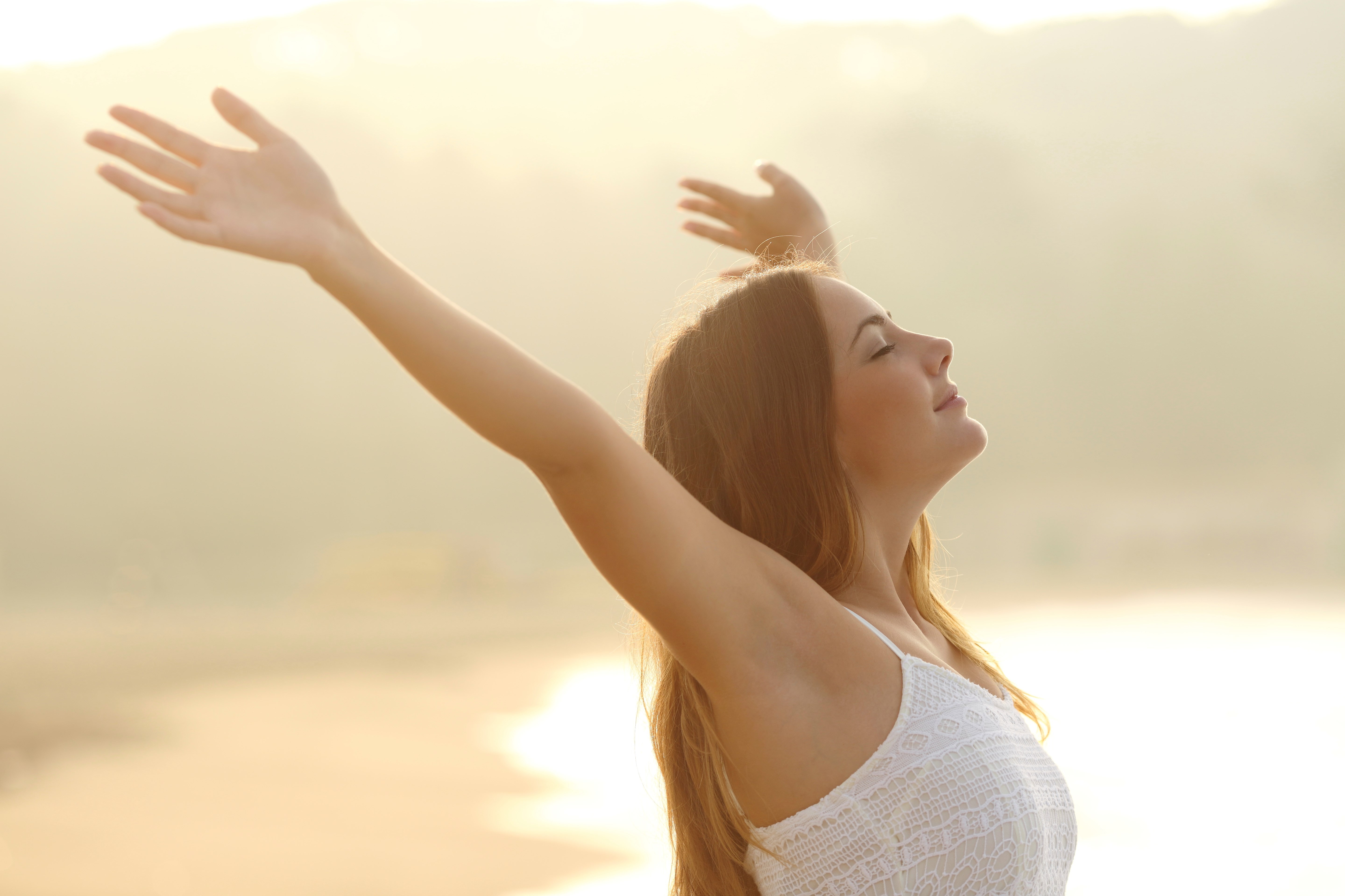 woman meditating in open air 