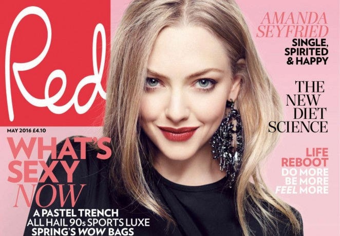 Magazine cover featuring a woman with long blonde hair, wearing a black top and large earrings, with text about fashion and lifestyle.