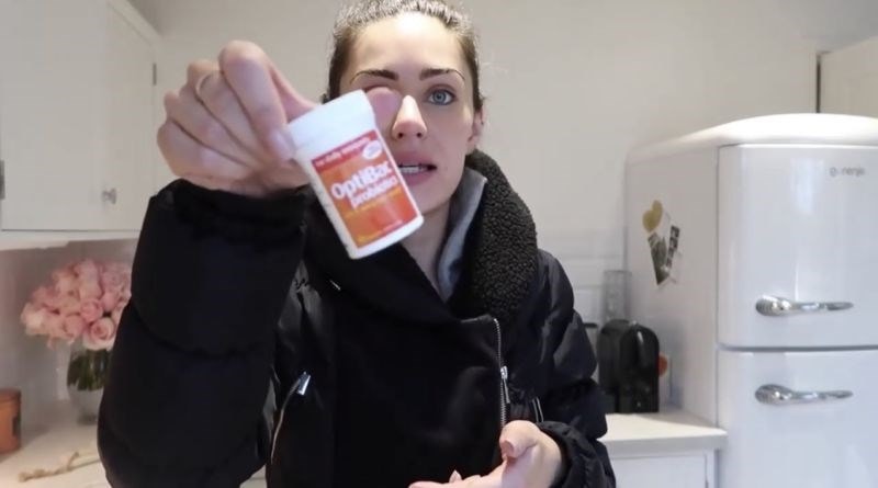 Lydia Millen holding Optibac product 