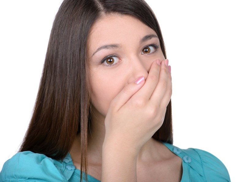 woman holding breath