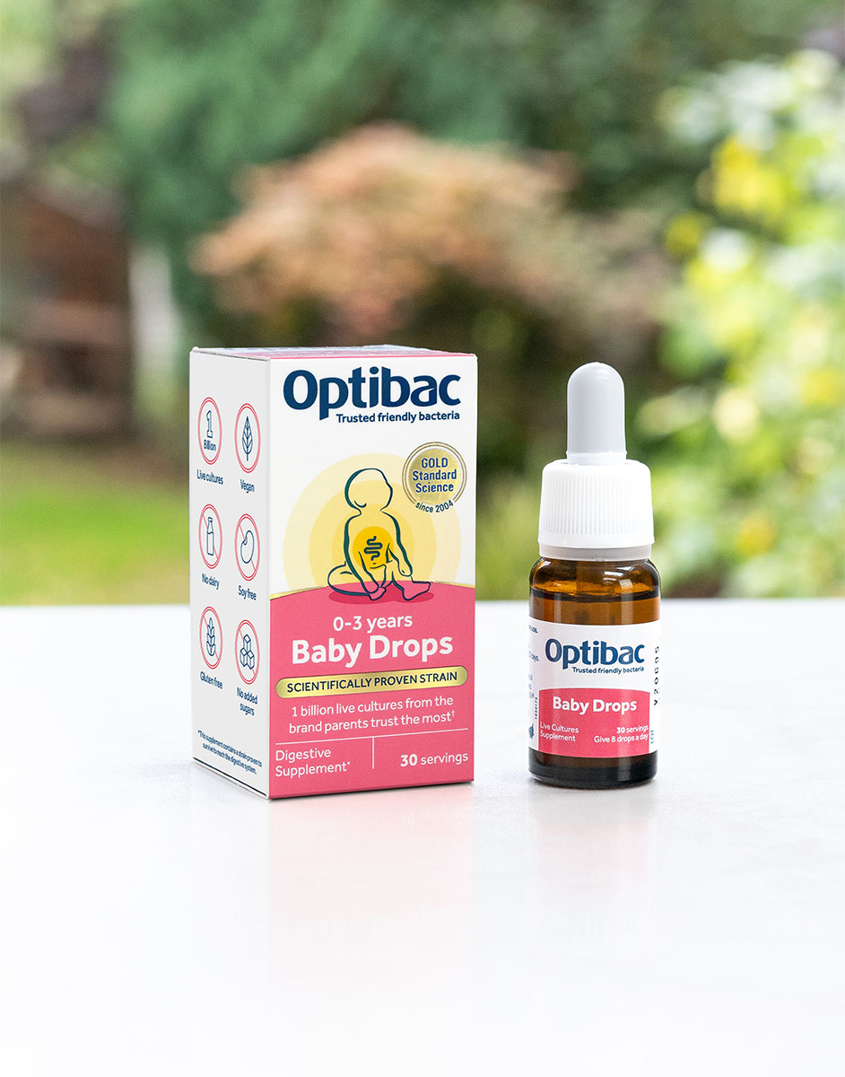 Optibac Baby Drops box and bottle on a white surface, featuring digestive supplement details for ages 0-3 years.