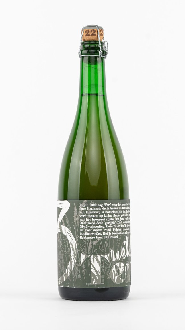 A studio shot of a green 3 Fonteinen bottle on a white background, highlighting the label details and cork finish.
