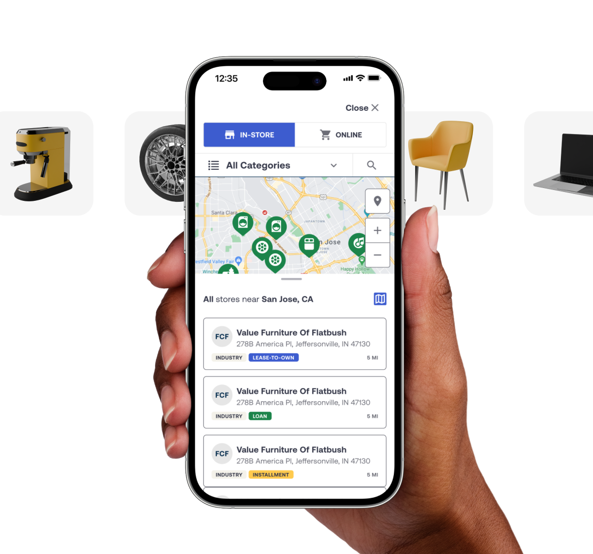Hand holding a smartphone displaying a store locator map with pins, furniture, coffee machine, wheel, and laptop icons in the background.