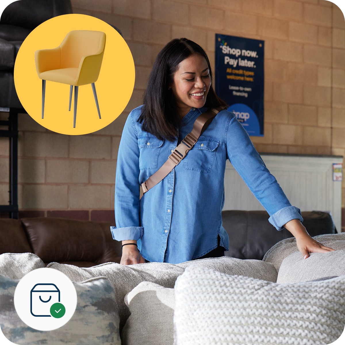 Woman in a denim shirt smiles while touching a sofa in a showroom. A yellow chair icon and shopping app logo are visible.