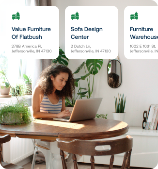 A woman looking at her laptop at a dining table. Overlaid are three cards showing different stores to shop at.