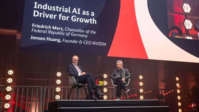Bundeskanzler Merz und NVIDIA CEO Huang auf der Bühne