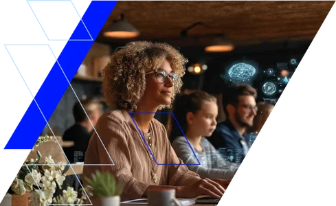 Menschengruppe sitzt an einem Tisch. Es wird ein Symbolbild für Bildung und Kompetenzerwerb im Kontext von KI.