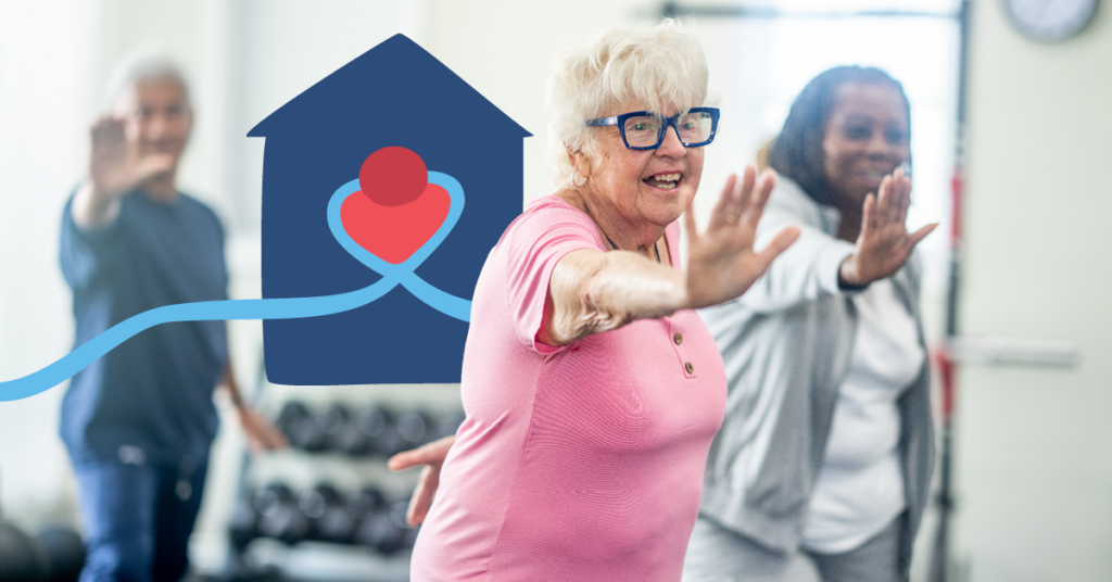 Seniors exercising indoors, smiling and stretching, with a heart and home graphic in the background.