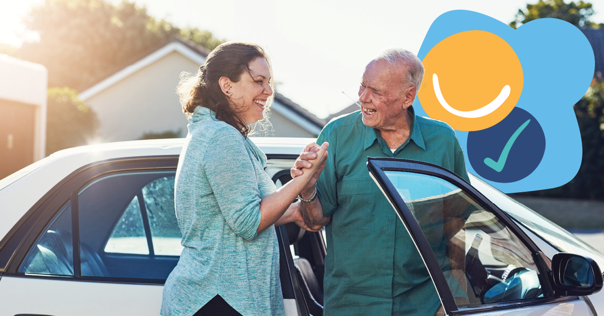 A woman helps an elderly man out of a car, both smiling. A cheerful graphic with a smiley and checkmark is in the background.