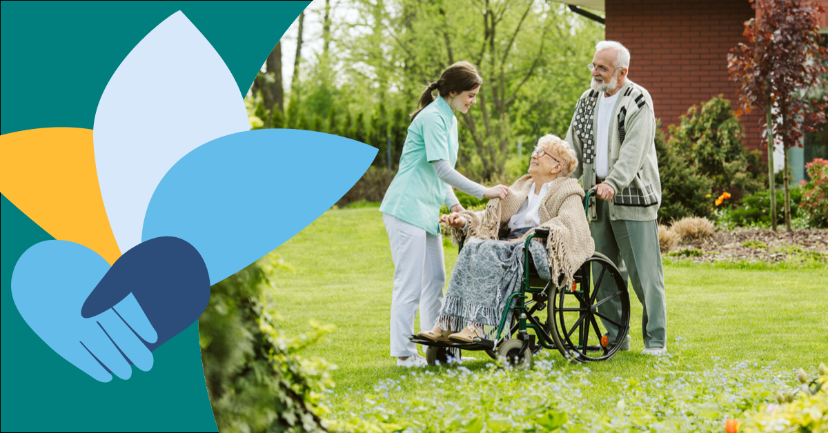 A caregiver assists an elderly woman in a wheelchair, with an elderly man standing nearby in a garden. A logo with hands and petals is on the left.
