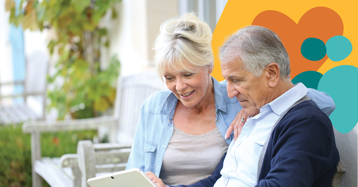 An elderly couple sits on a bench, smiling while looking at a tablet. A colorful abstract design is in the background.