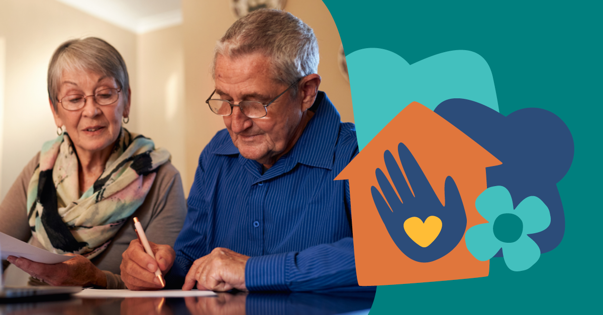 Elderly couple reviewing documents at a table, with a graphic of a house and heart in a hand overlayed on the right.
