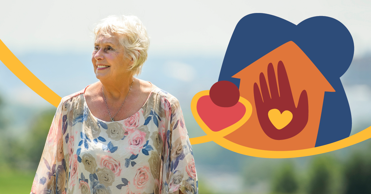 Elderly woman in floral dress smiles outdoors, with colorful graphic of a house, hand, and heart in the background.