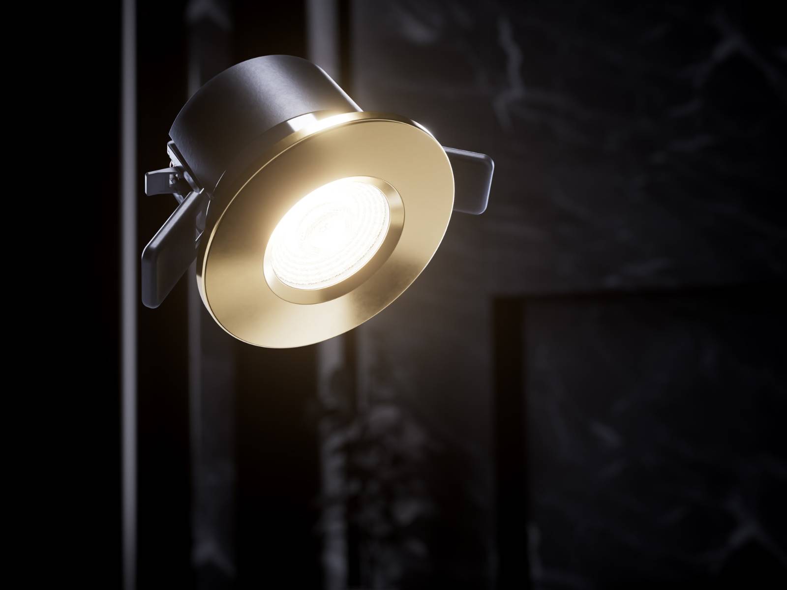 UNIVERSAL DOWNLIGHT mit rundem Cover in Gold schwebend vor einem dunklen Hintergrund.