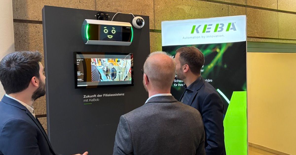 Visitors at the SVN Security Days 2026 discussing the AI-powered surveillance system KeBob at the KEBA stand.