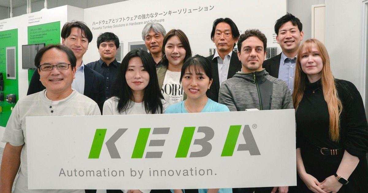 Person holding a hard hat with digital data graphics overlay, including charts and technology symbols, suggesting a smart construction concept.