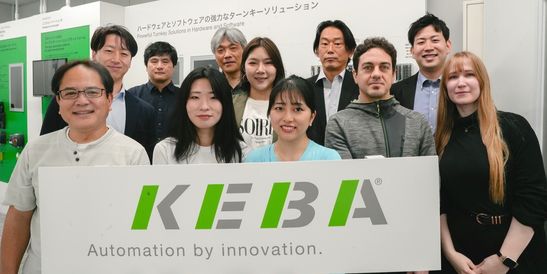 Person holding a hard hat with digital data graphics overlay, including charts and technology symbols, suggesting a smart construction concept.