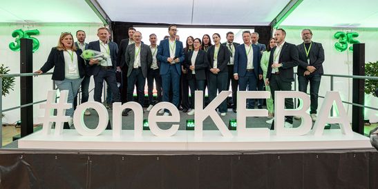 A team of KEBA employees sings “Happy Birthday” at the KEMAS anniversary celebration.er "Happy Birthday"